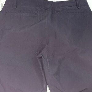 Men’s 2 pair Oakley shorts. Black and navy.  Size 38.  Used.